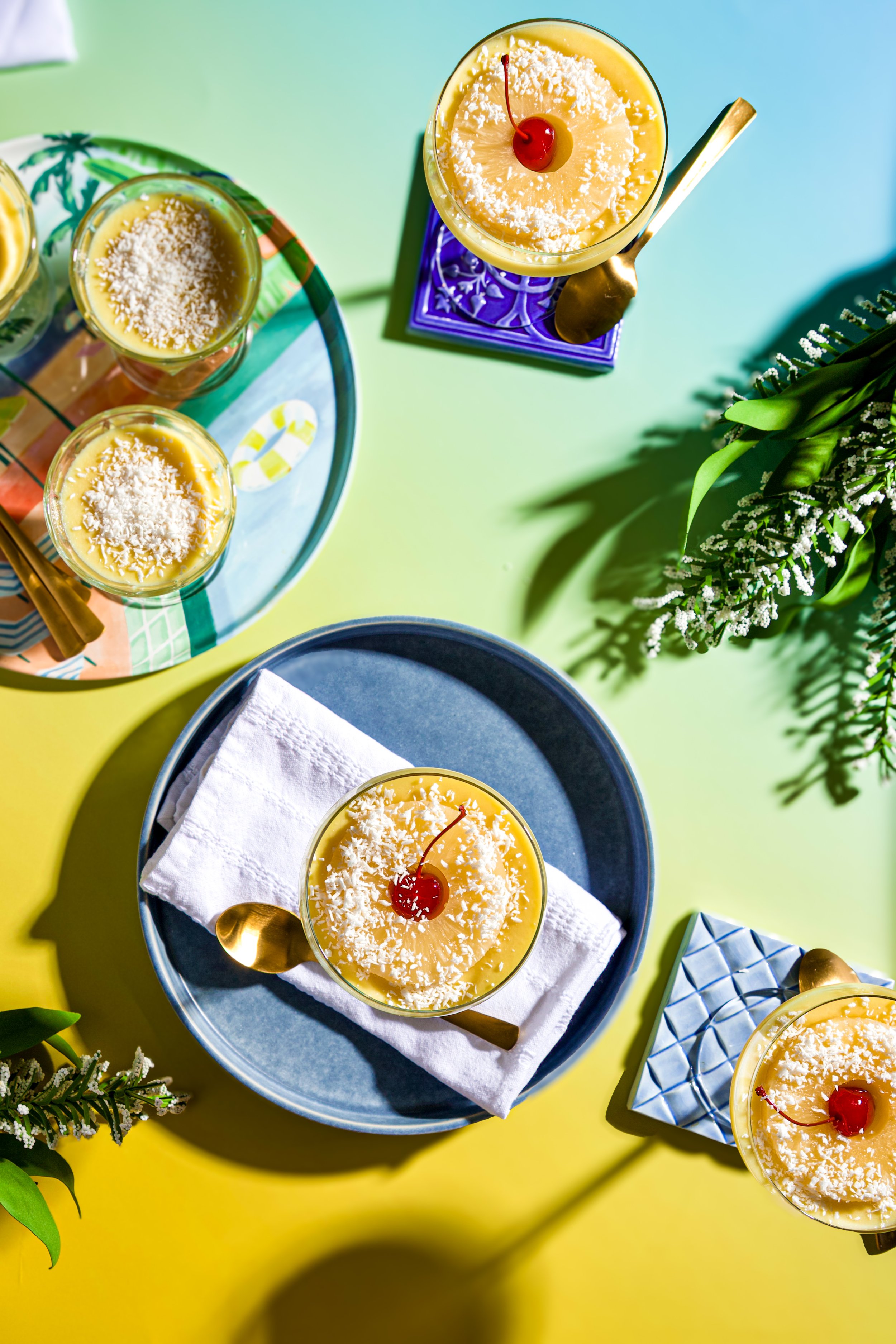Pina Colada Dessert in a sunny day. Backdrop yellow and green, bright picture