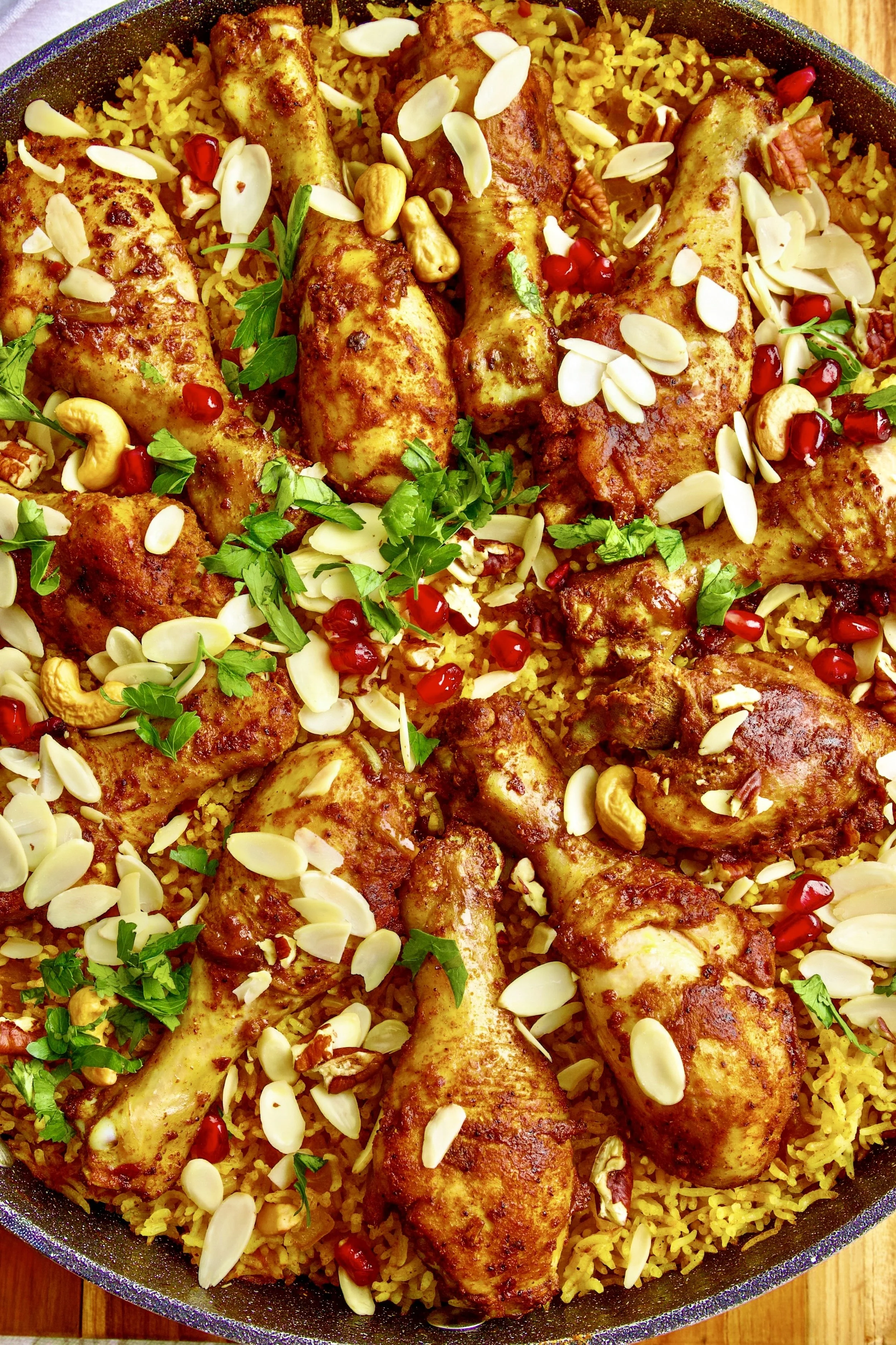 Chicken Mashboos and jasmine rice with spices pomegranate on the top