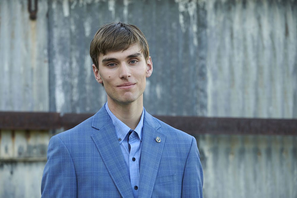 04 senior portrait in suit tin.jpg