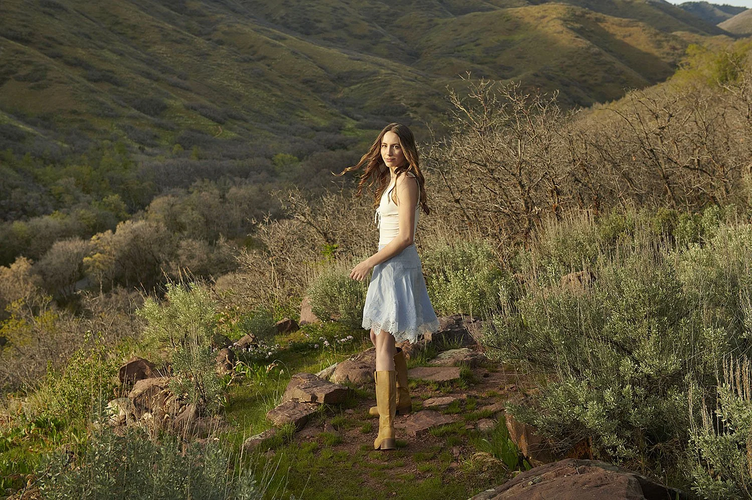 Kirsten Hepburn Photography senior class portrait of a teen walking in the foothills in Salt Lake City Utah
