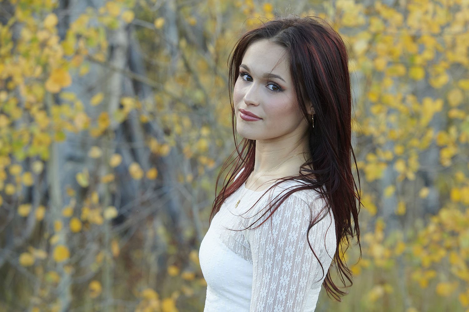 teen girl with autumn aspens