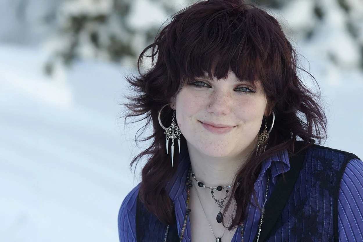 36 teen in purple in snow.jpg