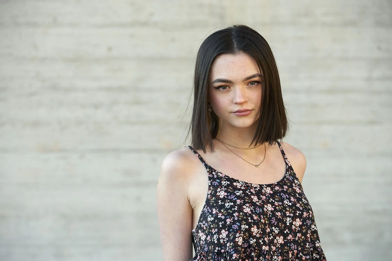 Kirsten Hepburn Photography portrait of girl in black floral swing dress