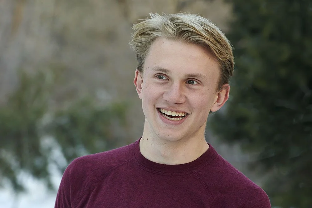 41 senior portrait snow boy.jpg