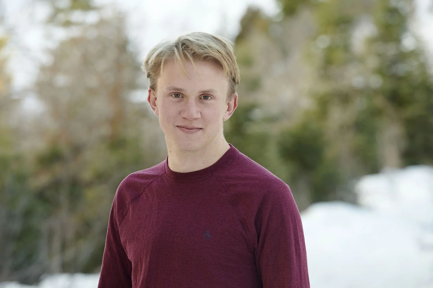 25 senior portrait boy in snow 2.jpg