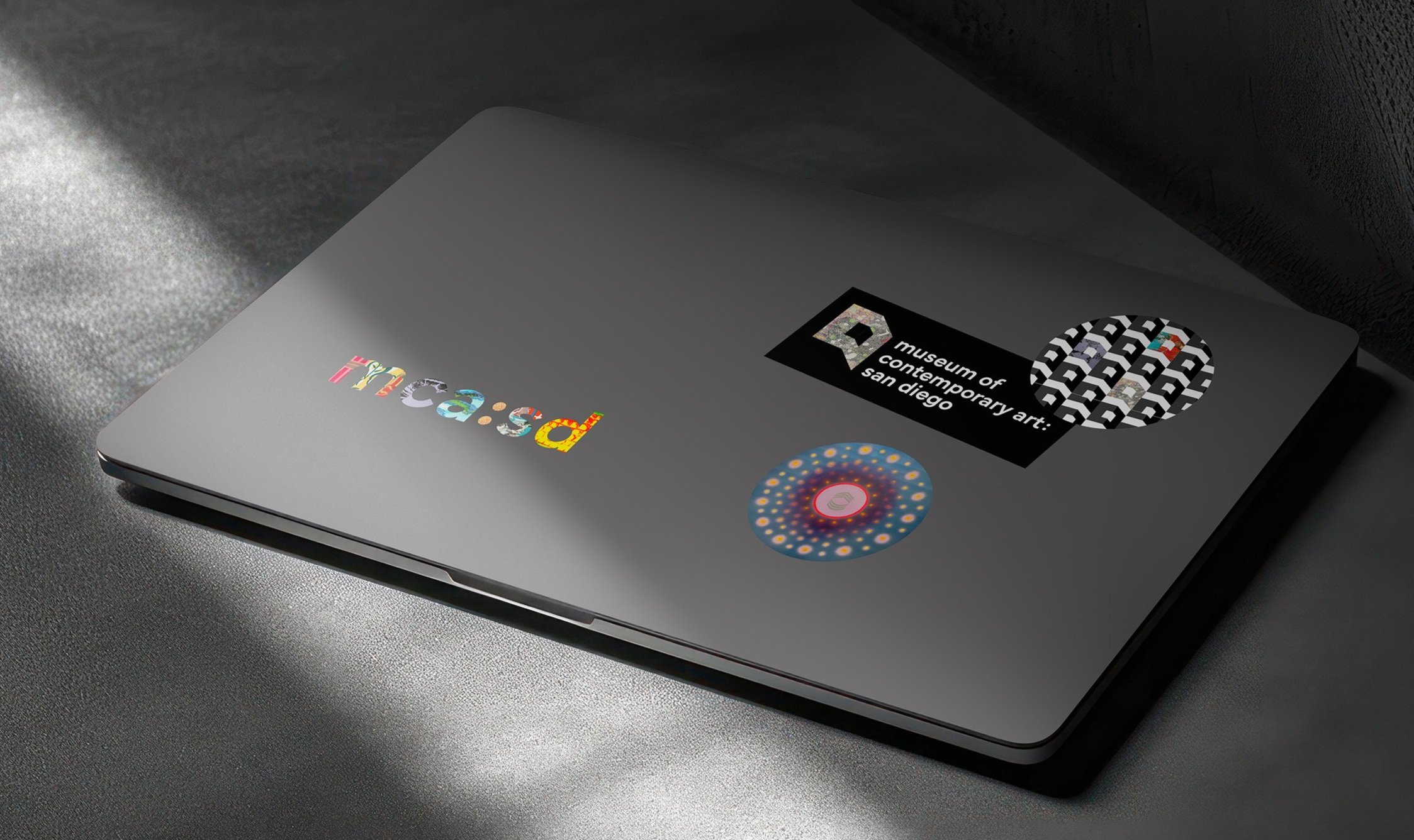 musuemstickersonmacbook.jpg