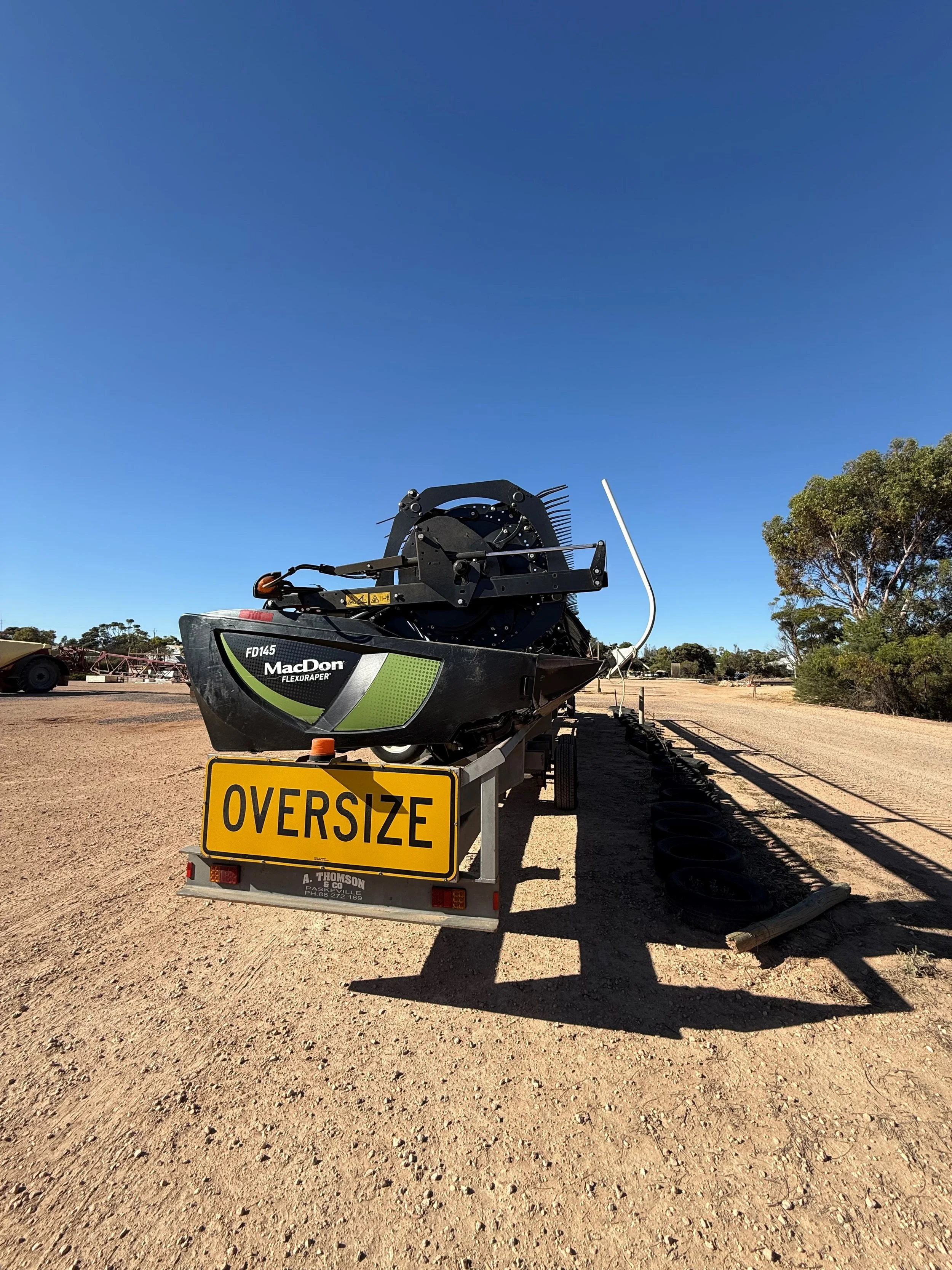 MacDon FD145 with trailer