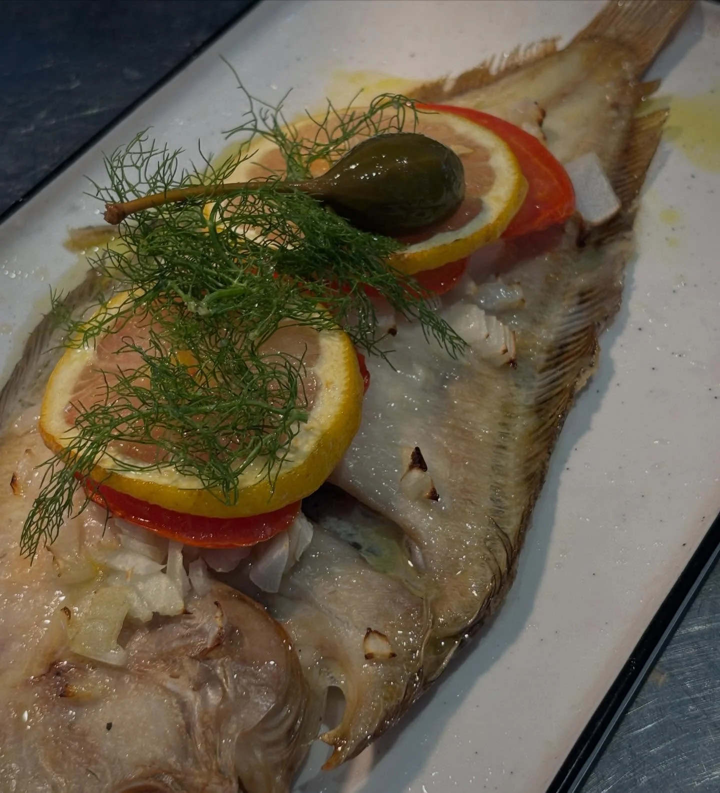 ~ Lemon Sole ~
Whole baked lemon sole, fennel, roasted tomato served with lemon-infused dressing. A must try. 🍋