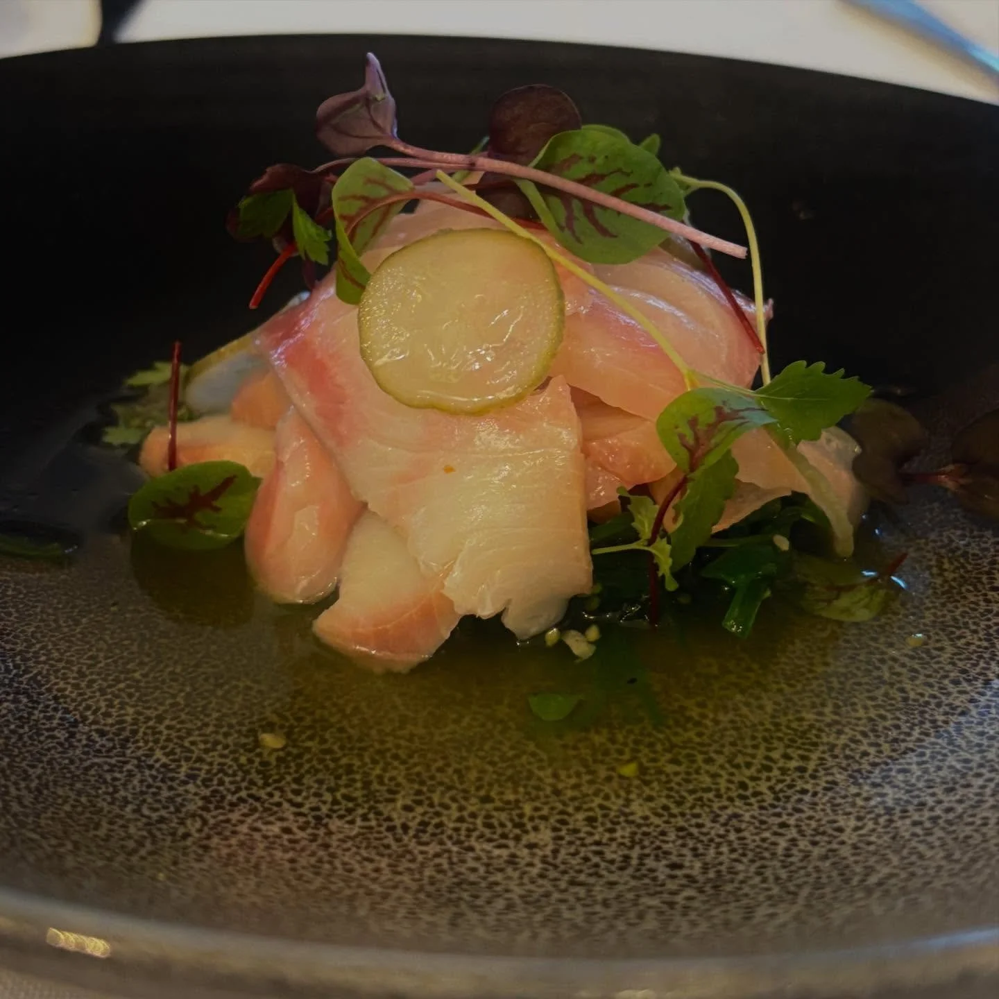 Our fresh kingfish crudo, with yuzu dressing, finger lime pearls and garden herbs🍋&zwj;🟩