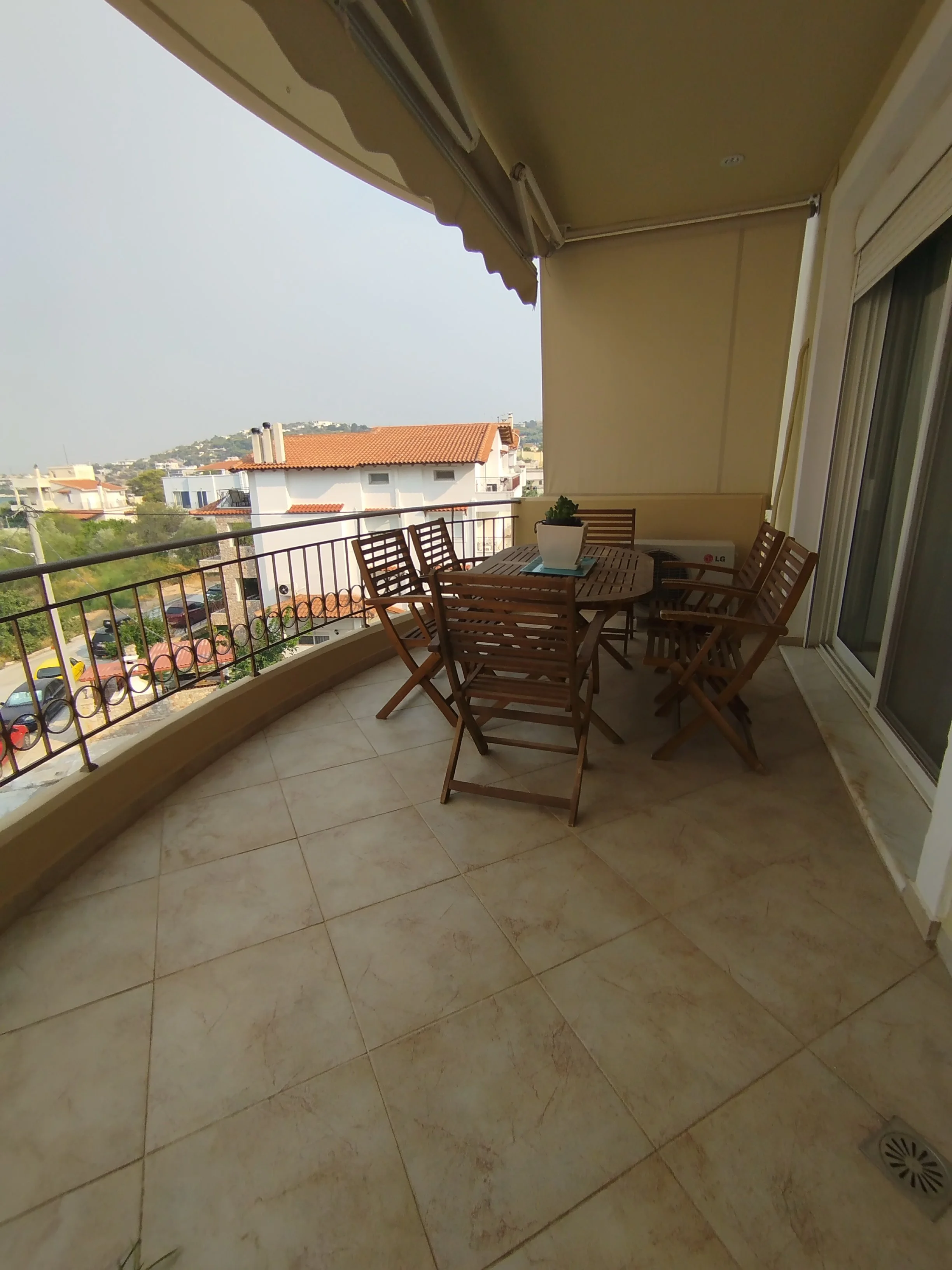 Stunning panoramic Aegean sea view from the balcony of a luxury apartment in Salamina, Greece.