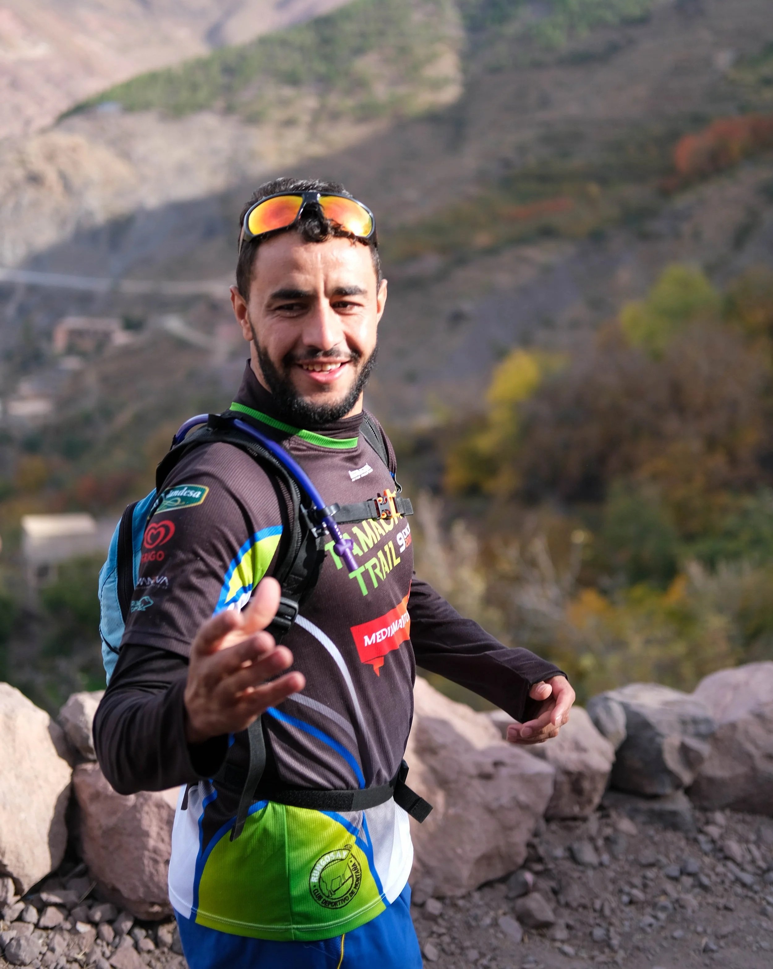 Trail runner mid run in Imlil, High Atlas mountains, Morocco