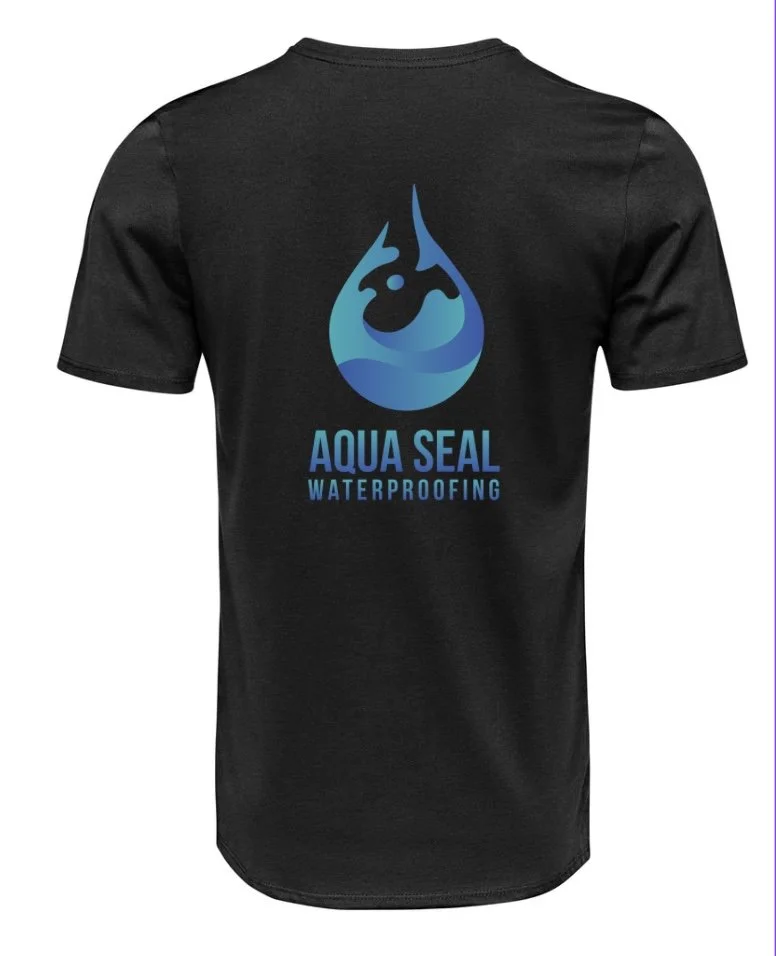 Black T-shirt with a blue water droplet logo and text reading "Aqua Seal Waterproofing" on the back.