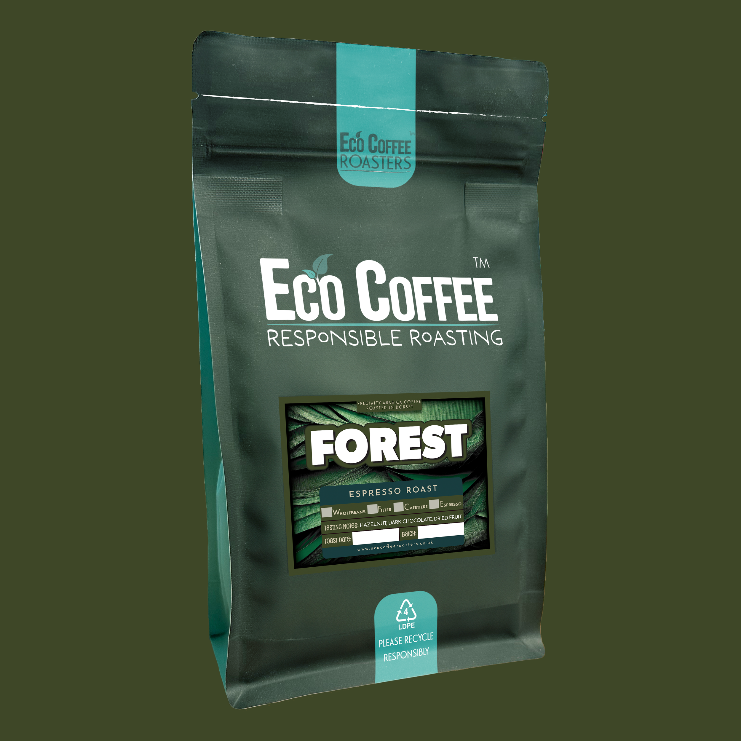 Eco Coffee Forest Dark Roast package leaning against a tree with a forest background.