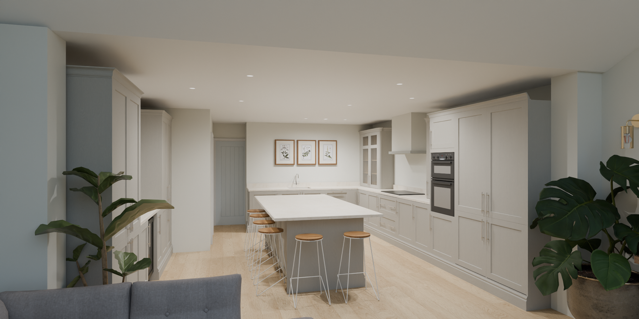 Modern white kitchen with island, bar stools, built-in double ovens, plants, and wall art.