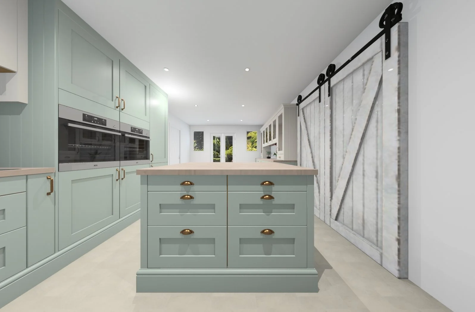 Modern kitchen with mint green cabinetry, an island with brass hardware, and sliding barn doors on the right. The kitchen has a clean, minimalist design with natural light from the windows in the background.