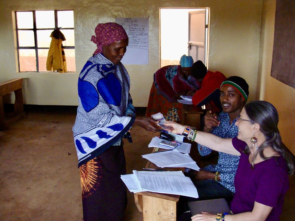 Distributing women's loans in Tloma Village