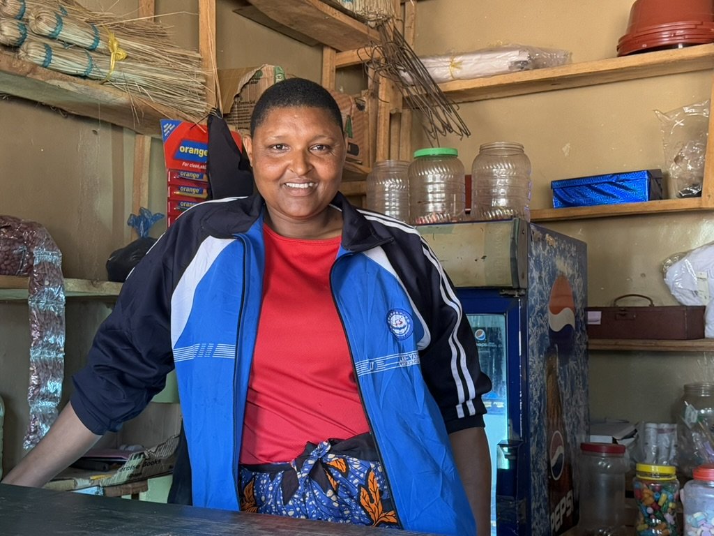 Paulina sells various food, beverages and household items at her shop
