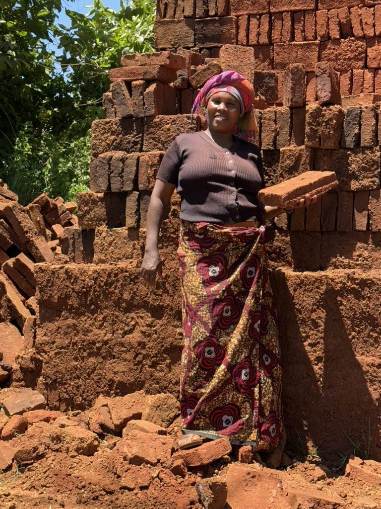Joan has a business selling home-made bricks from her house