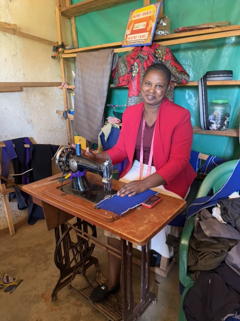 Linda at her sewing shop business