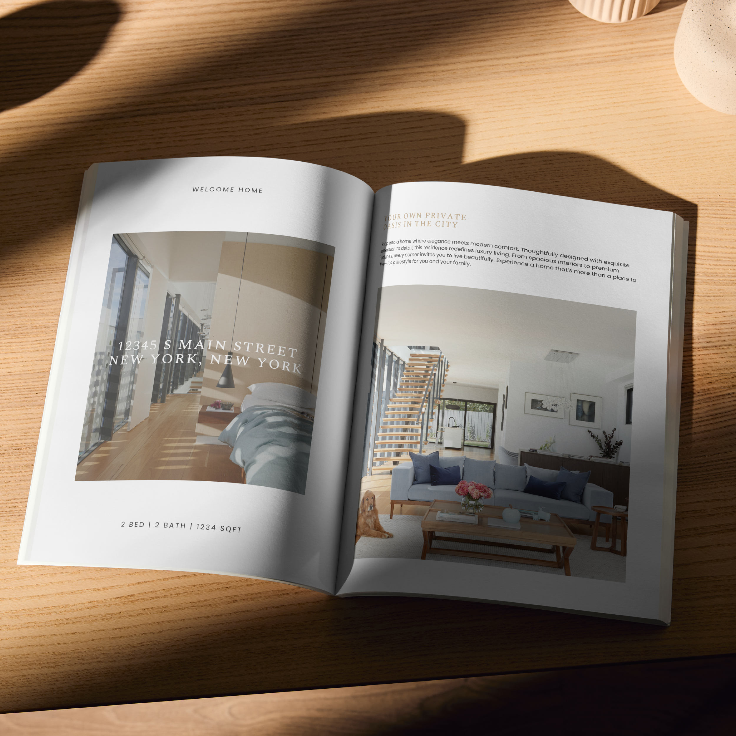 An open book on a desk featuring The Stella booklet template.