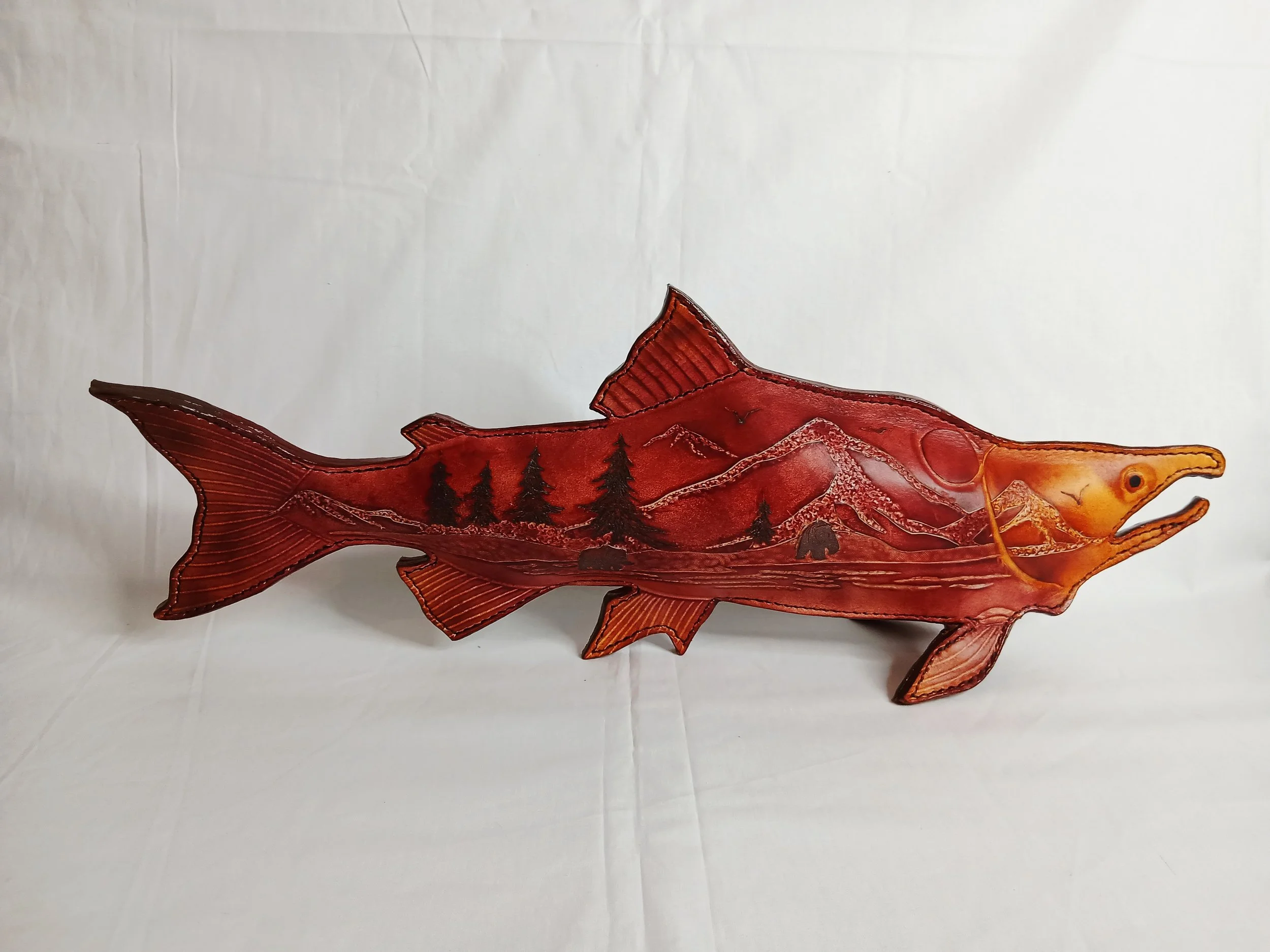 Red Run Retribution — Award-winning, hand-carved vegetable-tanned leather sculpture.