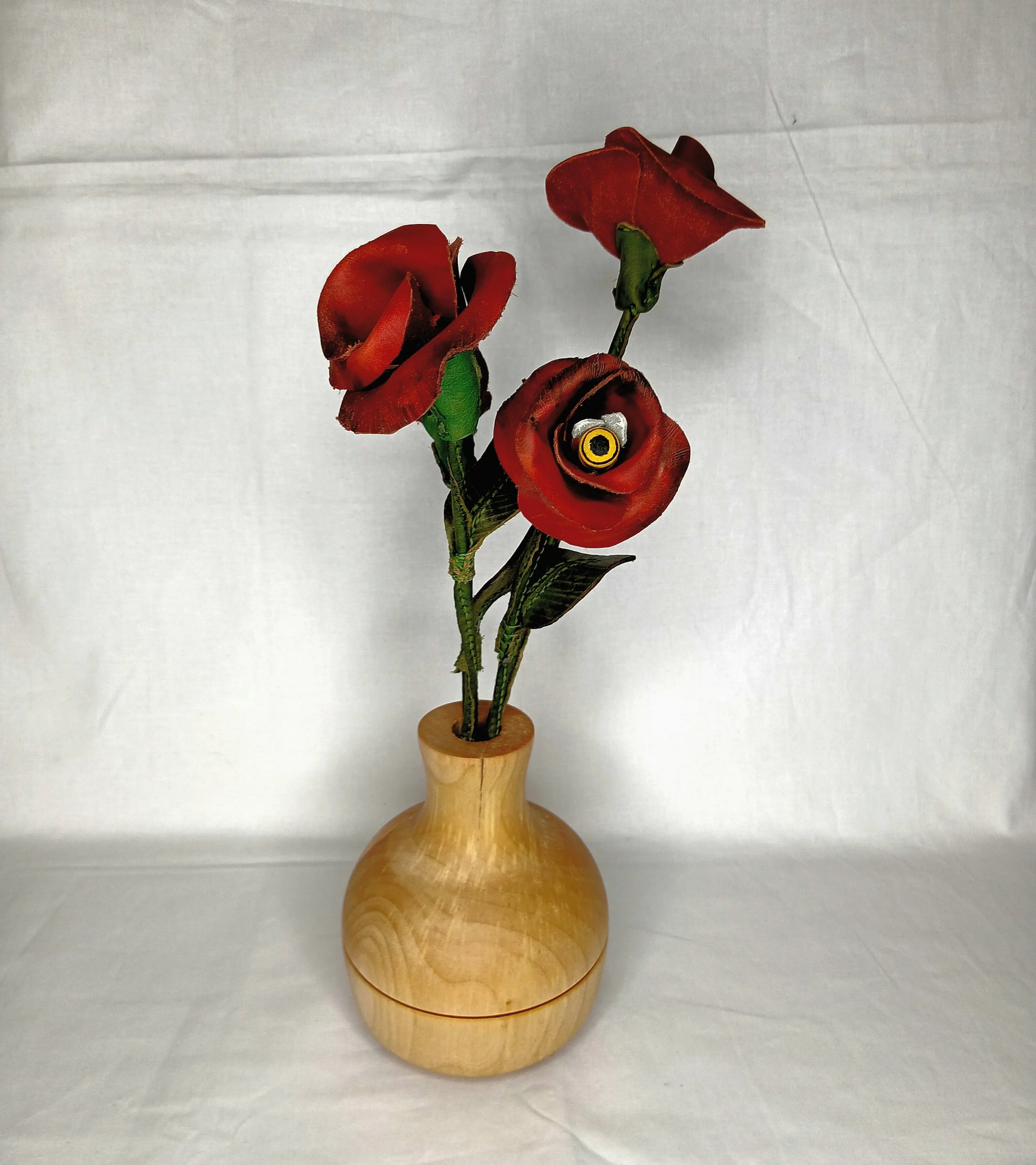 The Keeper of the Rose: Leather Roses with a turned Birch wood vase and turned and painted bumble bee drinking the nectar from a Rose.