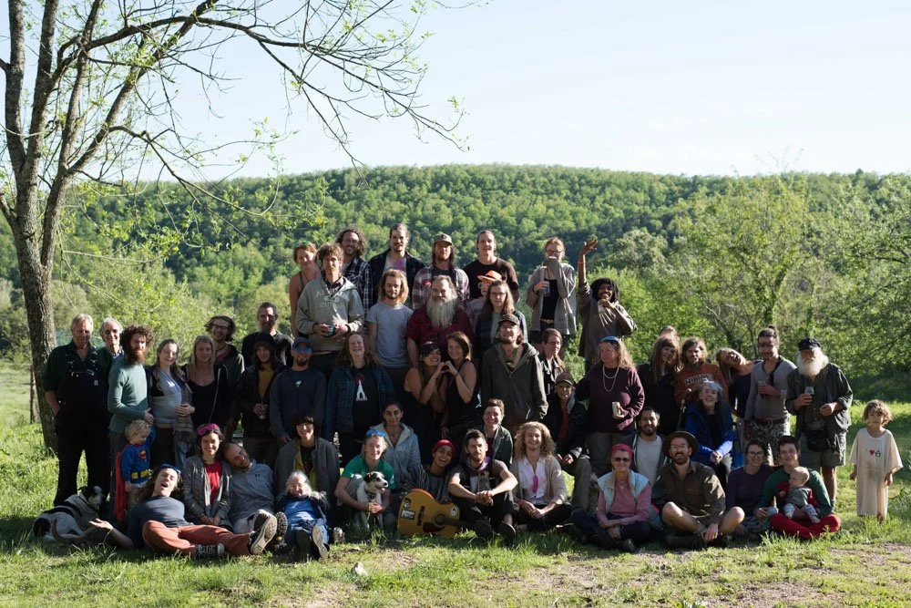 Members of East Wind posing for a picture