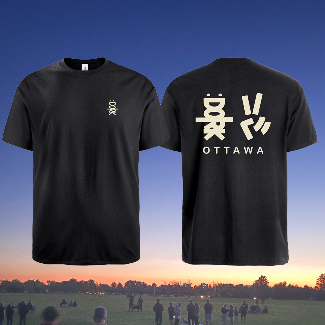 Black t-shirt with small front Dork logo and bold Ottawa peace wave graphic on the back