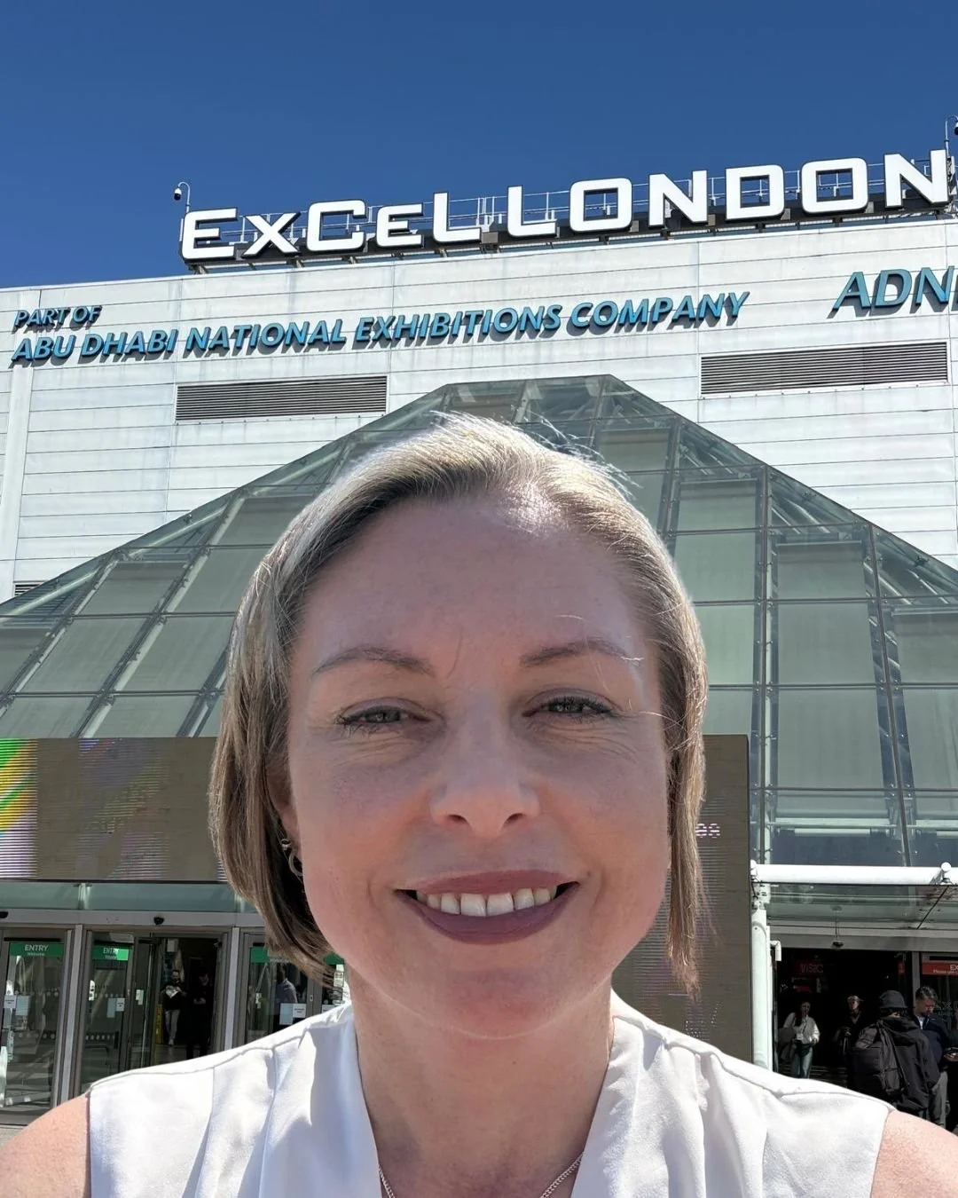Jane Feilden in front of the ExCel Centre London for Learning Technologies 2026