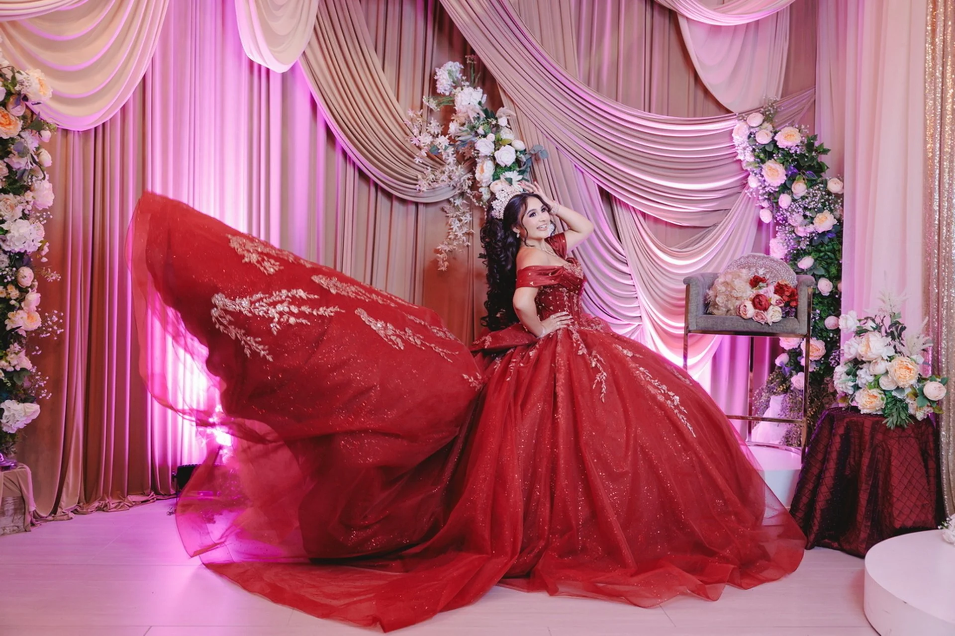 Flowing red quinceanera gown
