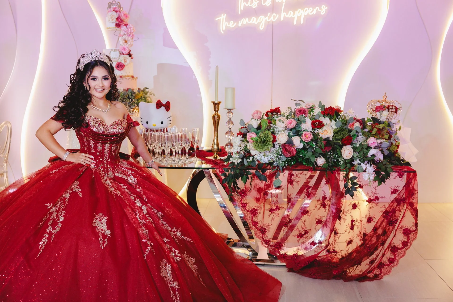 Girl celebrating Quinceneara in elegant red gown