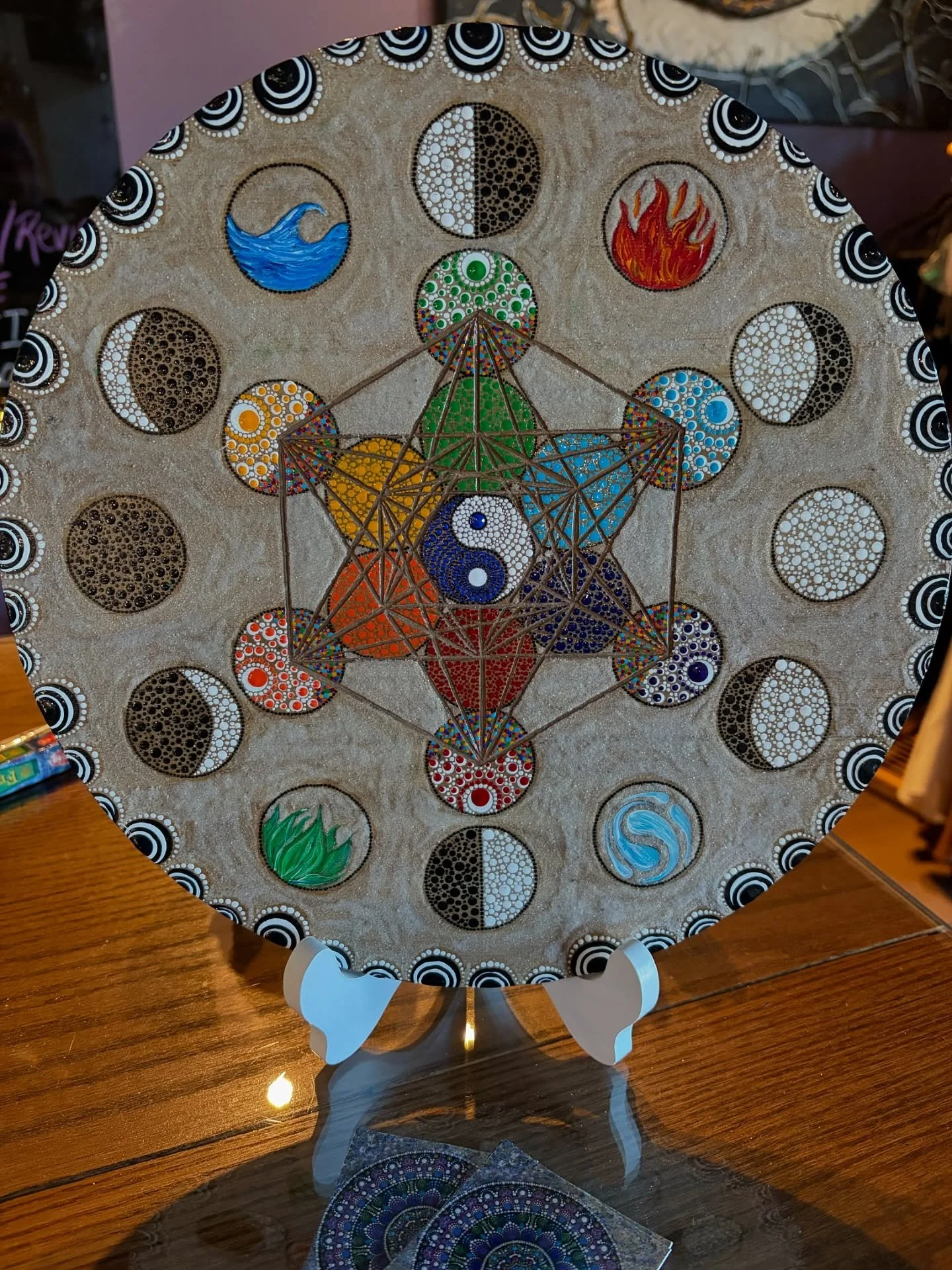 A new symbol enters our space.✨
A custom mandala infused with chakra energy, lunar rhythm, and elemental balance, crafted exclusively for OMNIA by @mandala.mystique.art. 
As we move into the busy holiday season, may this symbol bring a moment of grou