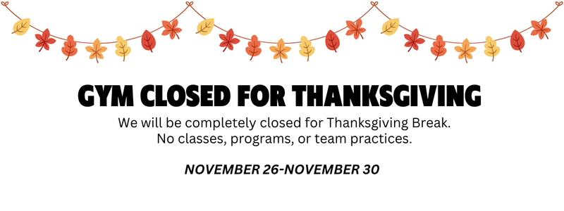 Fall-themed decoration with orange and yellow leaves and flowers hanging above a sign indicating the gym will be closed from November 26 to November 30 for Thanksgiving Break, with no classes or team practices.
