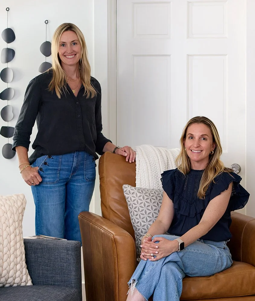 Sidemark Studio founders Ushi and Zoe in a styled living room