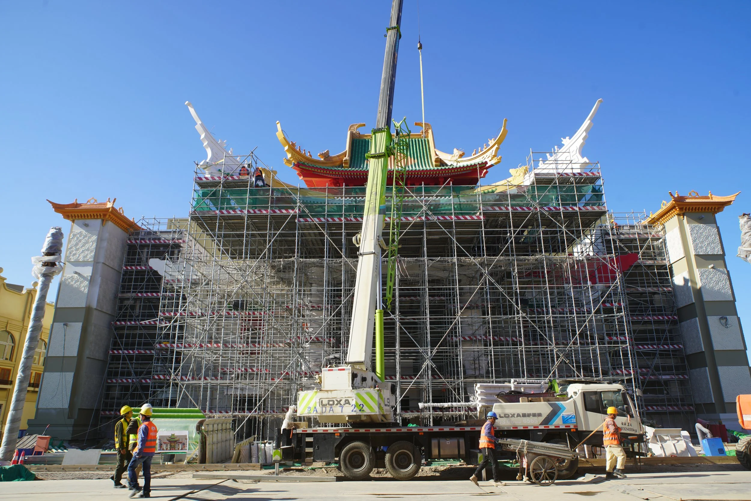 Constructability, Themed Building being built with crane and scaffolding.JPG