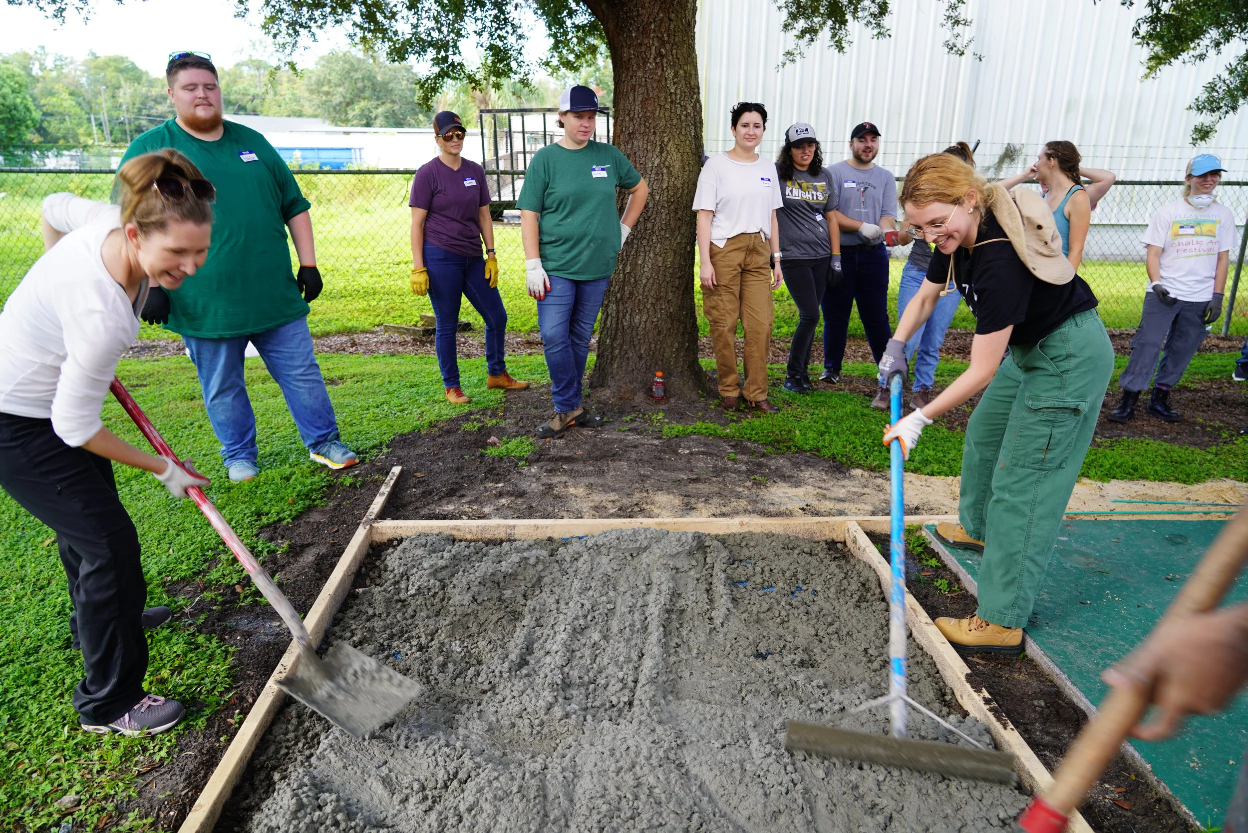 Students have fun learning how to place and consolidate concrete.JPG