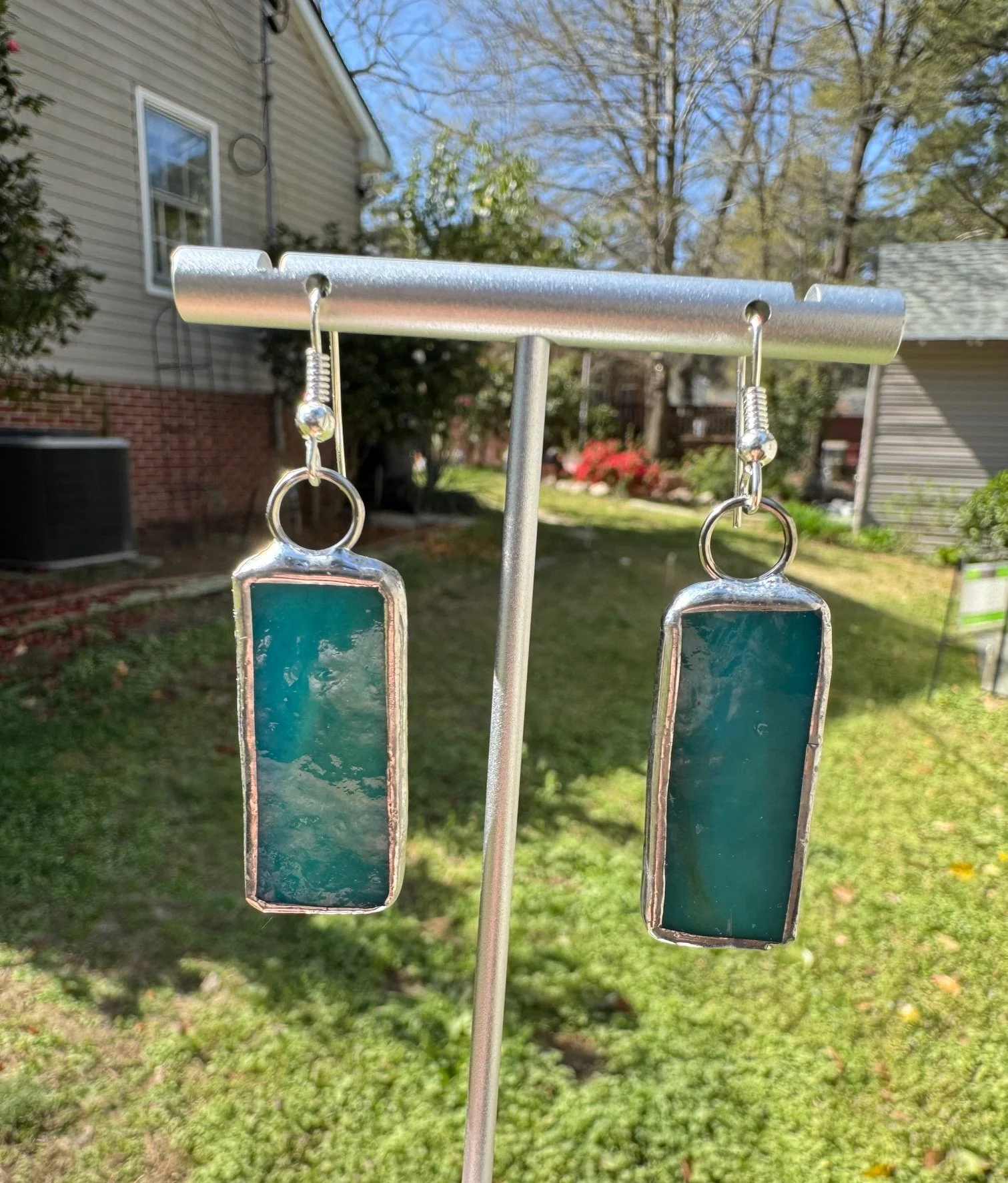 Oceanside Earrings outside in sunlight Kim S Joy.jpeg