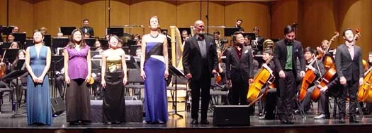Volti singers take a bow after performing Berio's "Sinfonia" with the UC Davis Symphony. Cecilia Lam, Sharmila Guha Lash, Yuhi Aizawa Combatti, Celeste Winant, Jeff Bennett, Sidney Chen, Jeff Wang and Julian Kusnadi, January 2015