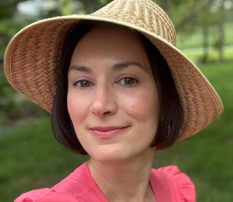 Chef-prepared event table featuring floral arrangements, handcrafted menus, and seasonal dishes for a private celebration.