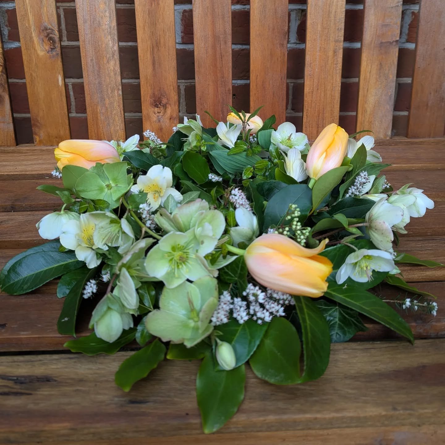 A simple yet special seasonal wreath, one of the beautiful Farewell Flowers choices at www.bunchlane.com.

Filled with hellebores, heather and tulips, reflecting the season &mdash; natural, elegant and a thoughtful way to honour a life. 🌿🌷
Created 