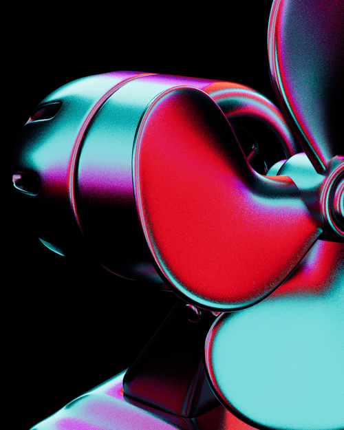 Close-up of a metallic, colorful fan animation against a black background.