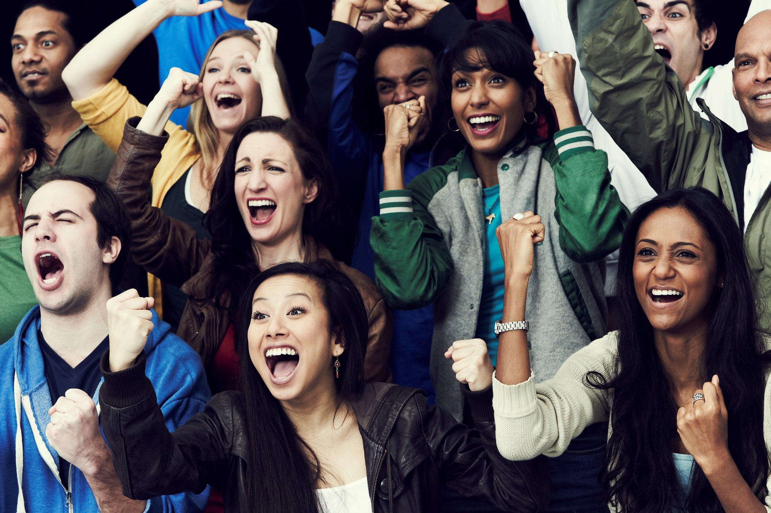A crowd getting into the game together.