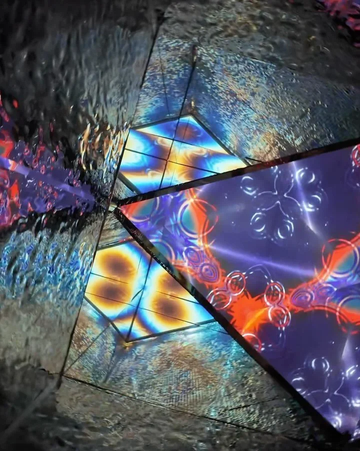 Aura | Phoenix, Arizona | 2024

Untitled Studio transformed an abandoned elevator shaft in a Downtown Phoenix restaurant into a mesmerizing experience. The result is a four-story-tall, walk-in, triple-chambered mirrored kaleidoscope&mdash;one of the 