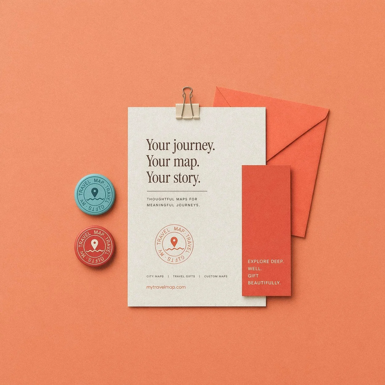 My Travel Map brand identity mockup featuring travel gifts stationery design, embossed logo, envelope and badges in warm Mediterranean color palette