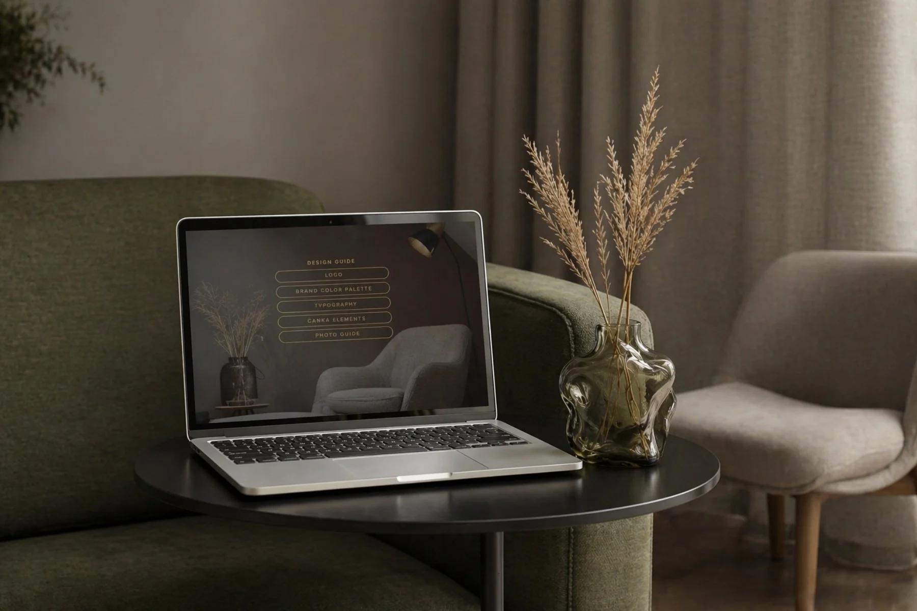 Psychotherapy brand identity shown in a warm therapy office interior with laptop mockup