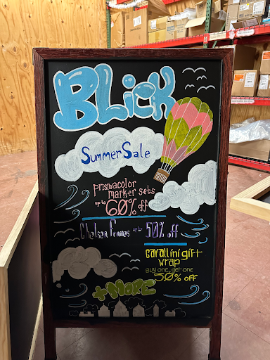 One of the chalkboard sales signs placed around and outside of the store for the Summer Sales Campaign