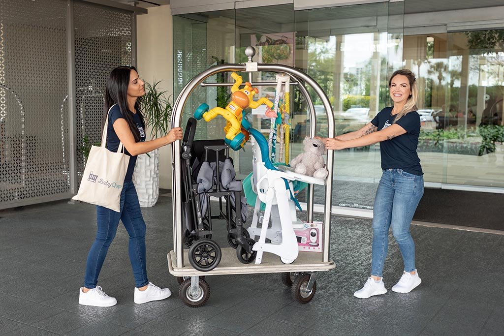 BabyQuip reps delivering baby rental gear.