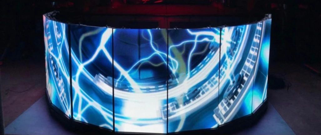 Curved LED screen with blue and white digital abstract design