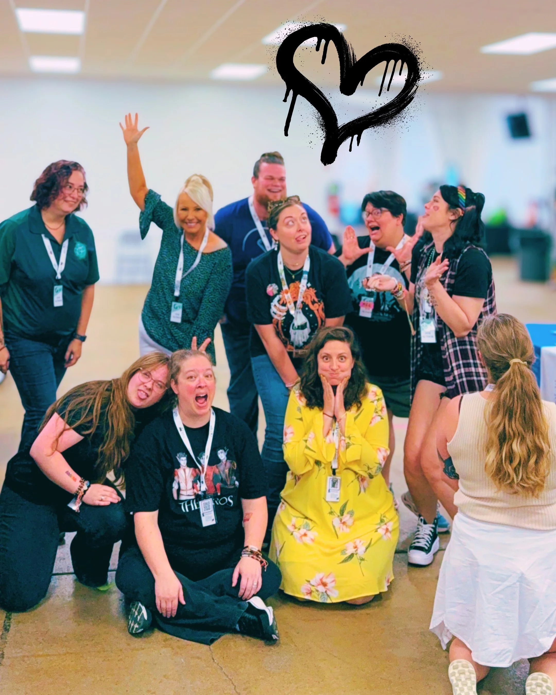 Picture of Lindsey Montgomery with various authors at Big Ohio Book Con doing funny faces