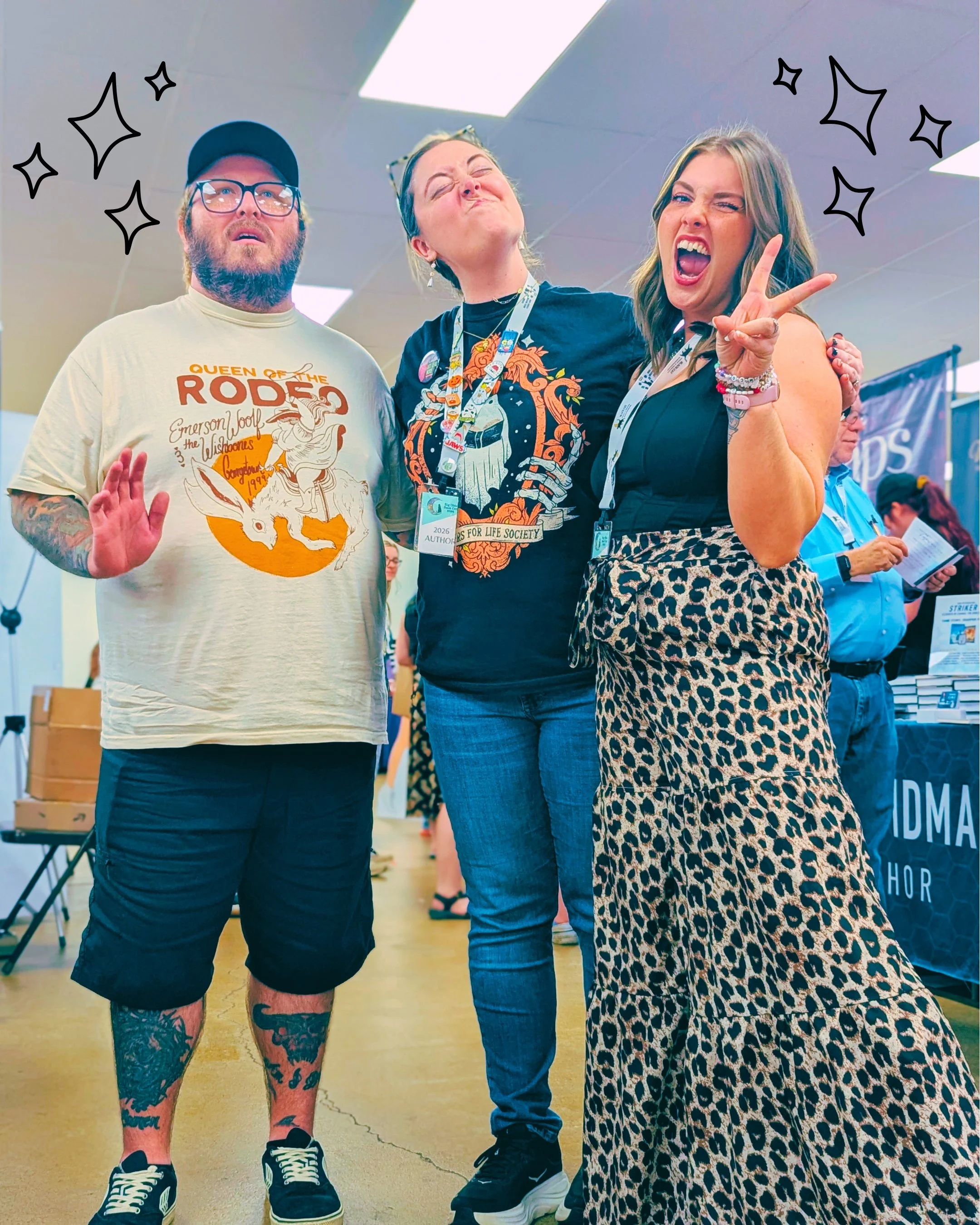 Picture of Lindsey Montgomery with various authors at Big Ohio Book Con doing funny faces